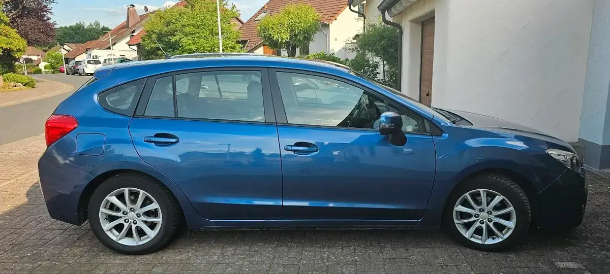 Gebraucht Subaru Impreza 114 PS (83 kW) 2013 Blau Limousine