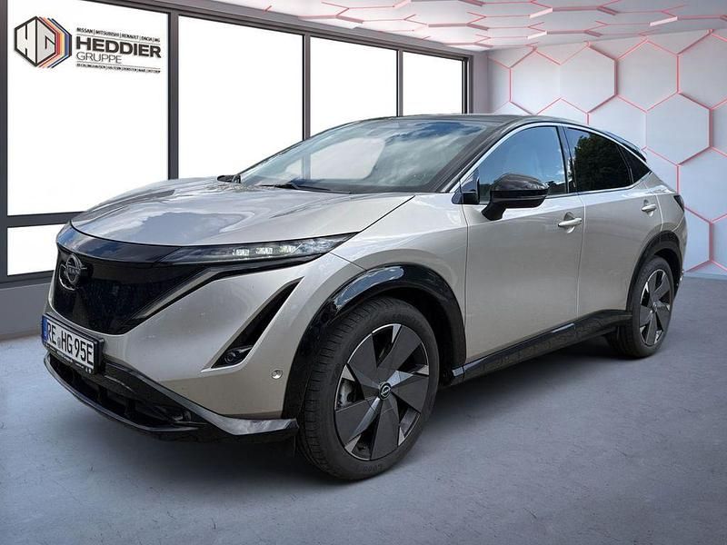 Warm silver (m) / black (m) Gebraucht 2024 Nissan Ariya Evolve SUV | 44.990 € (Fairer Preis) - Bild 1/4