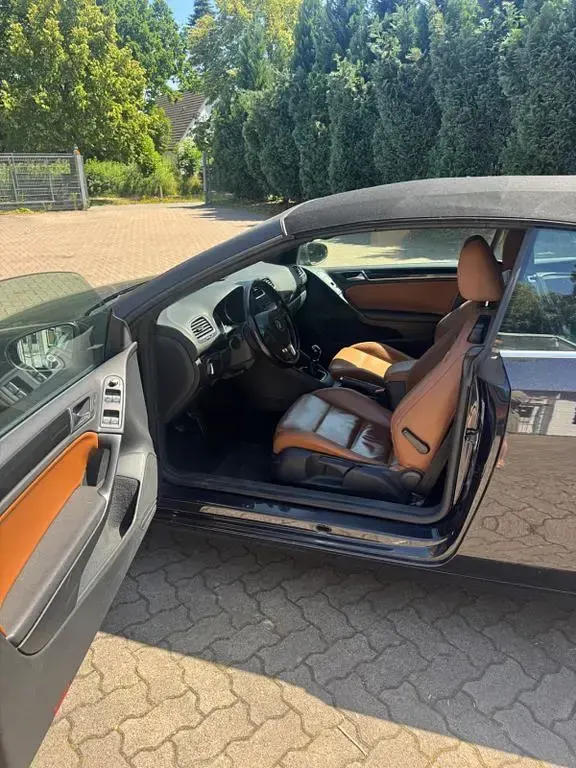 Gebraucht VW Golf 105 PS (77 kW) 2011 Schwarz Cabrio