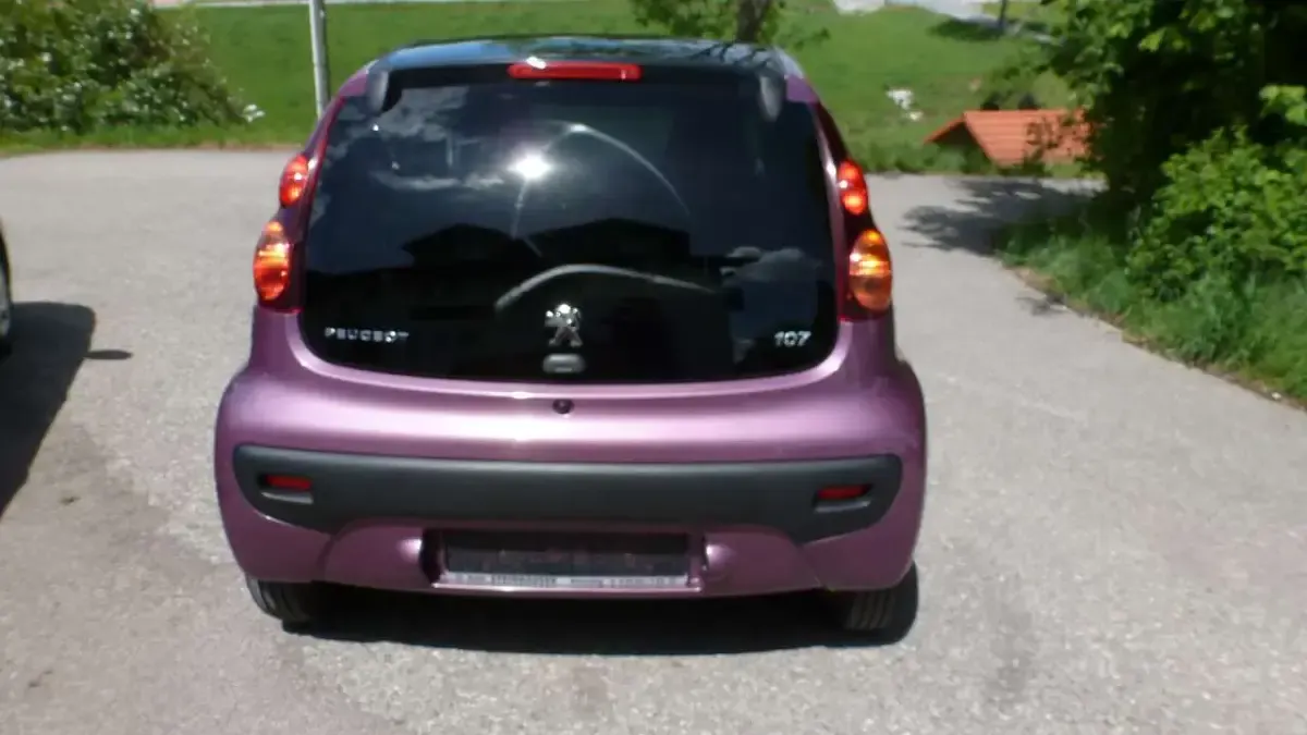 Gebraucht Peugeot 107 Active 68 PS (50 kW) 2014 Violett metallic Kleinwagen