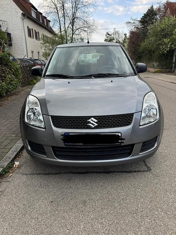 Second-hand Suzuki Swift 92 CP (67 kW) 2009 Gri Hatchback