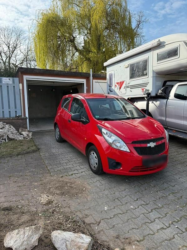 Second-hand Chevrolet Spark 68 CP (50 kW) 2011 Roșu Hatchback