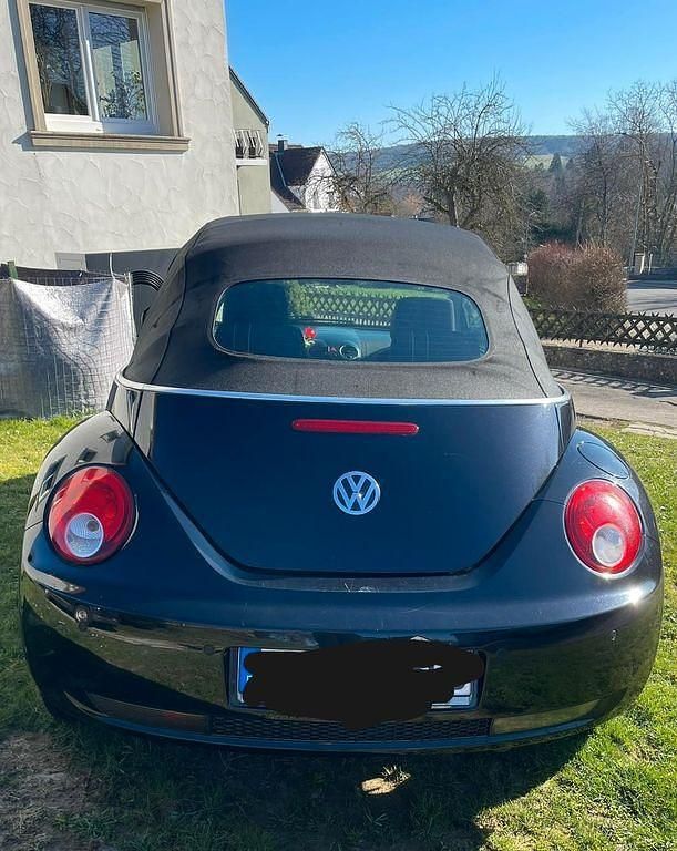 Gebraucht VW New Beetle Freestyle 105 PS (77 kW) 2010 Schwarz Kleinwagen