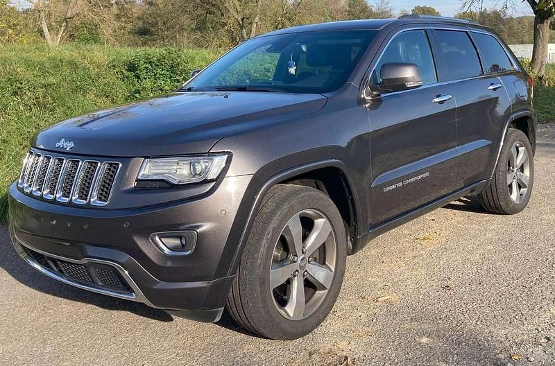 Grau Gebraucht 2016 Jeep Grand Cherokee Overland SUV | 22.000 € (Fairer Preis) - Bild 1/4
