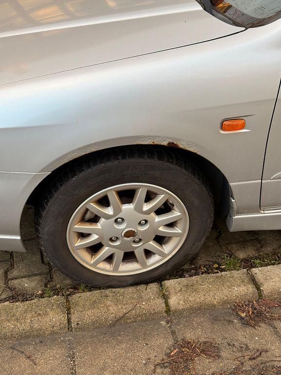 Gebraucht Nissan Primera 114 PS (83 kW) 2000 Silber Kombi