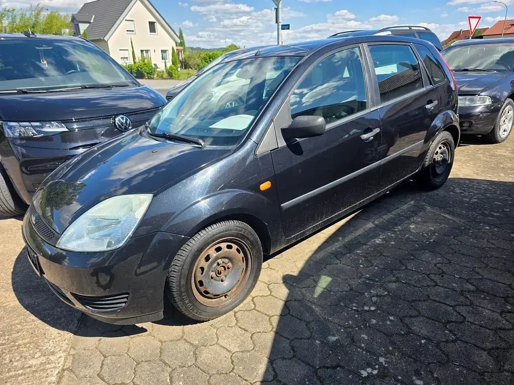 Gebraucht Ford Fiesta Ambiente 69 PS (50 kW) 2005 Schwarz Kleinwagen