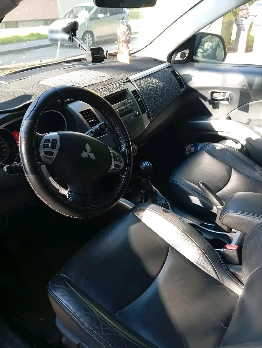 Begagnad Mitsubishi Outlander 156 HK (114 kW) 2009 Svart SUV