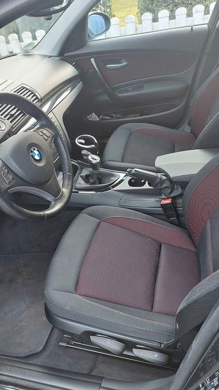 Gebraucht BMW 116 122 PS (89 kW) 2008 Schwarz Kleinwagen