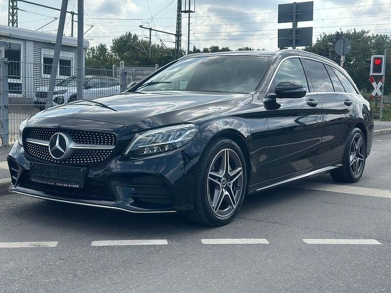 Schwarz Gebraucht 2021 Mercedes C220 AMG line Limousine | 21.700 € (Guter Preis) - Bild 1/4
