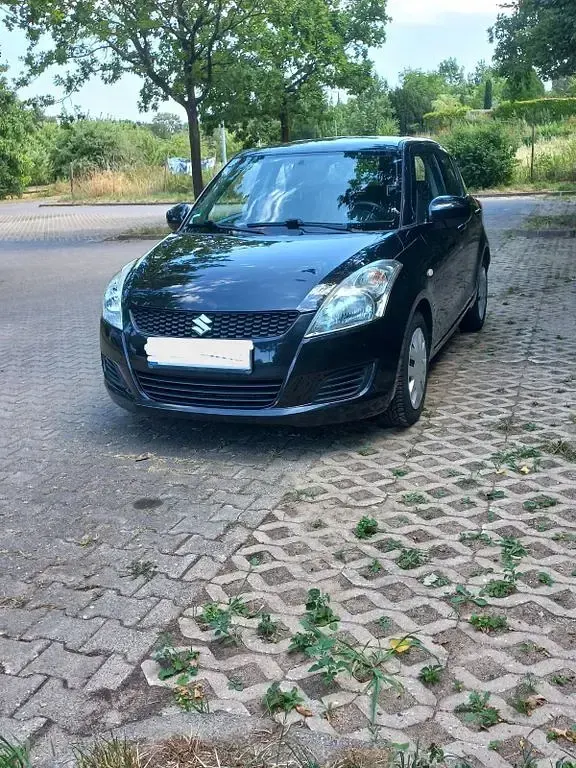 Gebraucht Suzuki Swift Comfort 94 PS (69 kW) 2014 Schwarz Kleinwagen