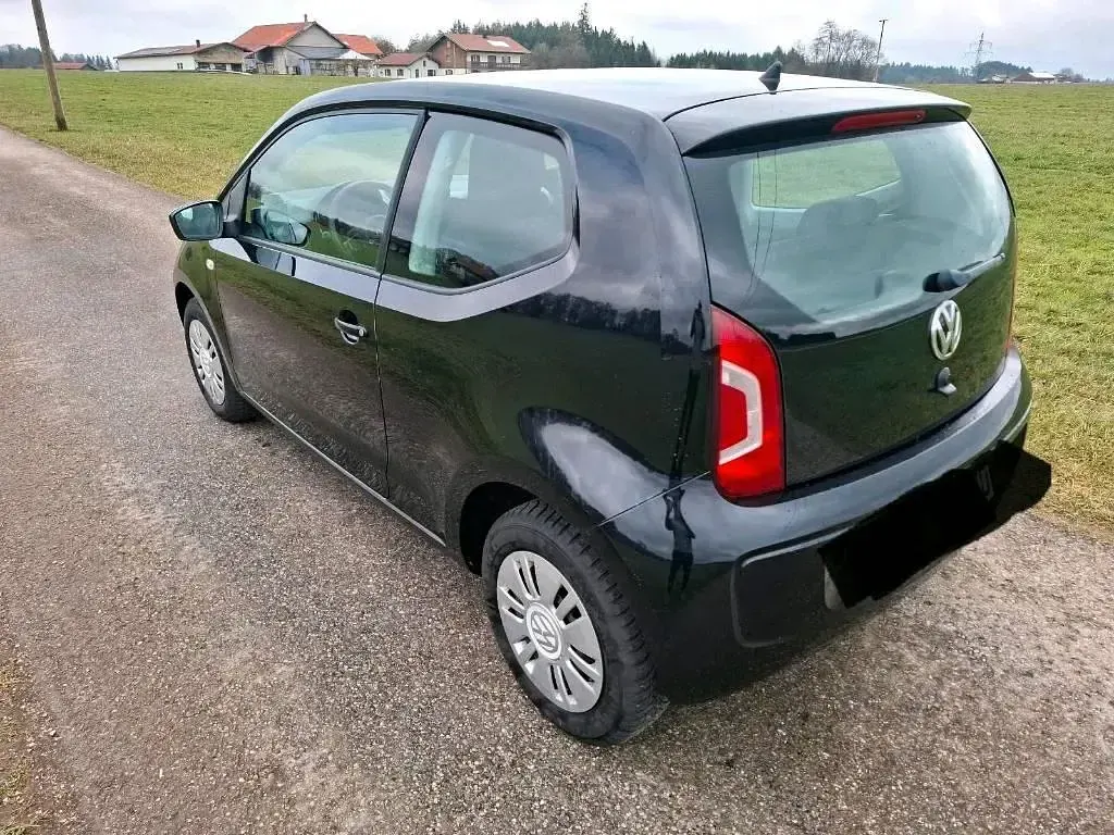 Usado VW up! 60 CV (44 kW) 2012 Negro Utilitario