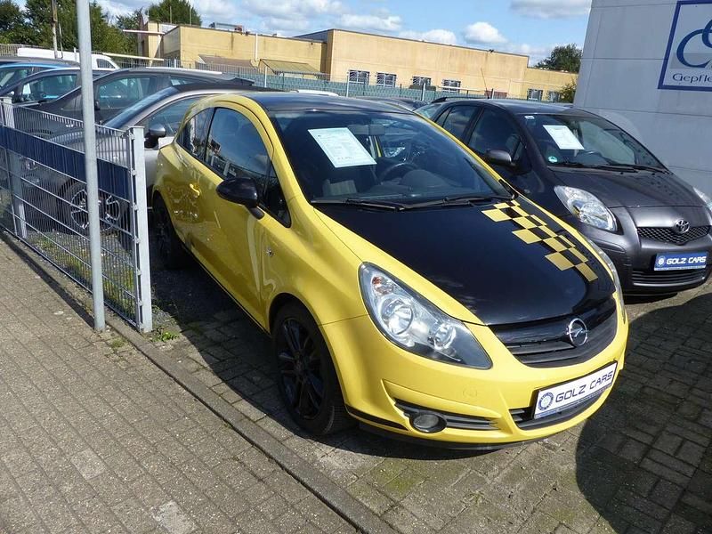 Gebraucht Opel Corsa 87 PS (63 kW) 2010 Sunny melon/saphirschwarz Kleinwagen