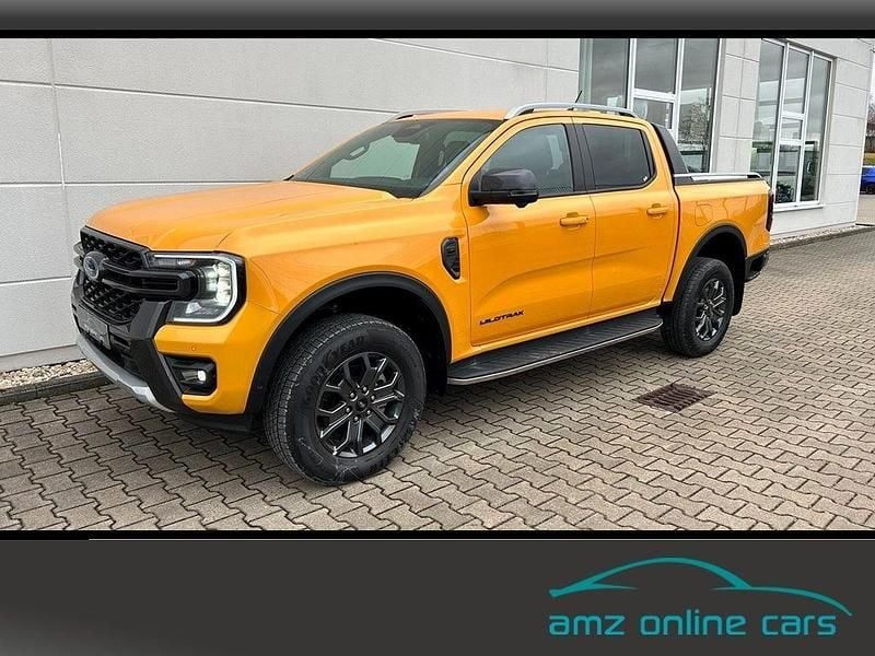 Cyber orange met Gebraucht 2024 Ford Ranger Wildtrack Abholung | 48.980 € (Superpreis) - Bild 1/4