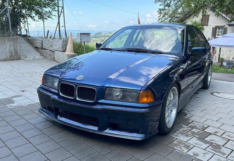 Blau Gebraucht 1991 BMW 320 Limousine | 7.950 € - Bild 1/4
