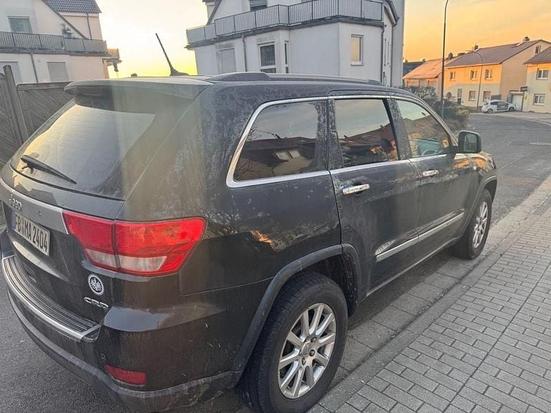 Gebraucht Jeep Grand Cherokee Overland 241 PS (177 kW) 2012 Schwarz SUV