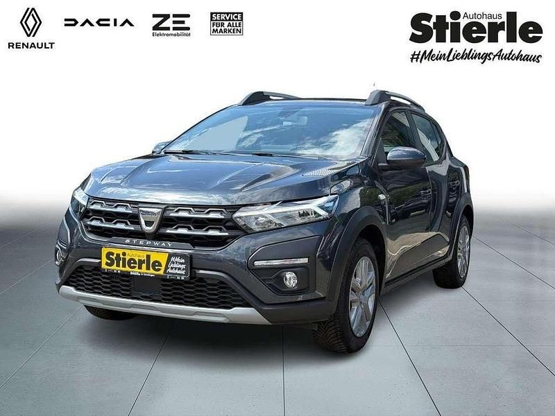 Grau Gebraucht 2023 Dacia Sandero Comfort Kleinwagen | 16.470 € (Fairer Preis) - Bild 1/4
