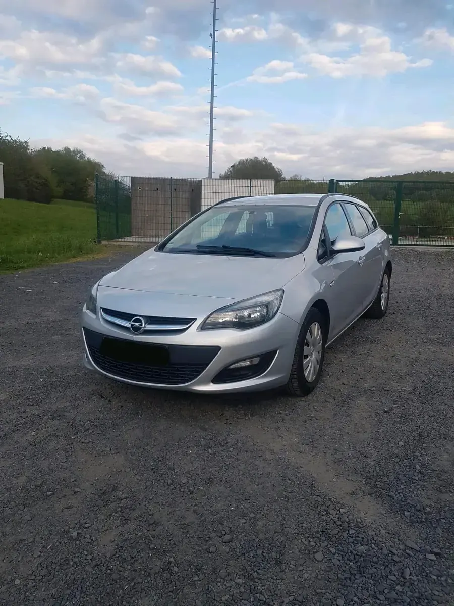 Second-hand Opel Astra 110 CP (80 kW) 2014 Argintiu Break
