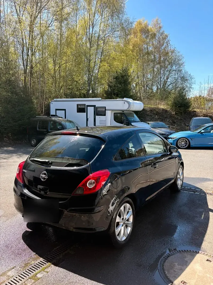 Gebraucht Opel Corsa 87 PS (63 kW) 2012 Schwarz Kleinwagen