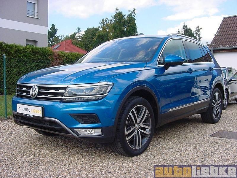 Carribeanbluemetallic Gebraucht 2017 VW Tiguan Highline SUV | 18.990 € (Fairer Preis) - Bild 1/4