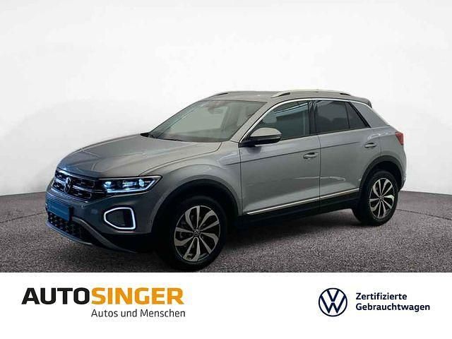 Pyritsilber metallic Gebraucht 2024 VW T-Roc Style SUV | 22.780 € (Superpreis) - Bild 1/3