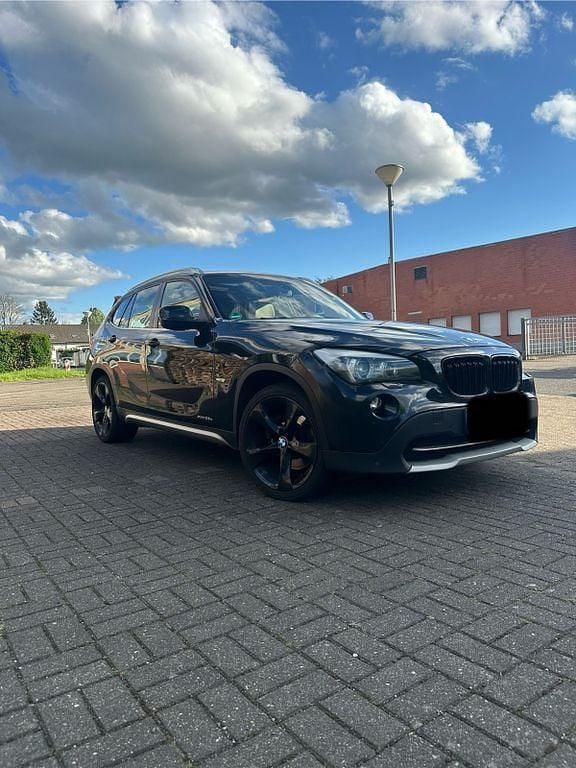 Second-hand BMW X1 204 CP (150 kW) 2009 Negru SUV