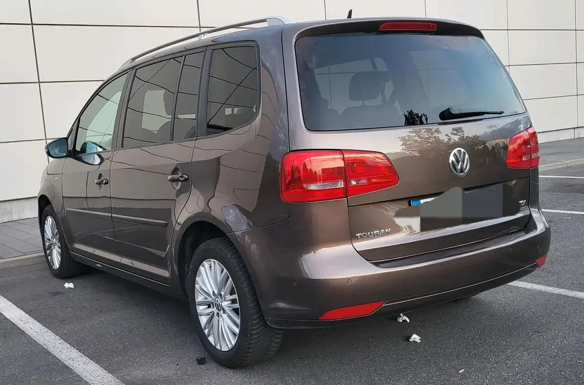 Gebraucht VW Touran Cup 105 PS (77 kW) 2014 Braun Van / Kleinbus