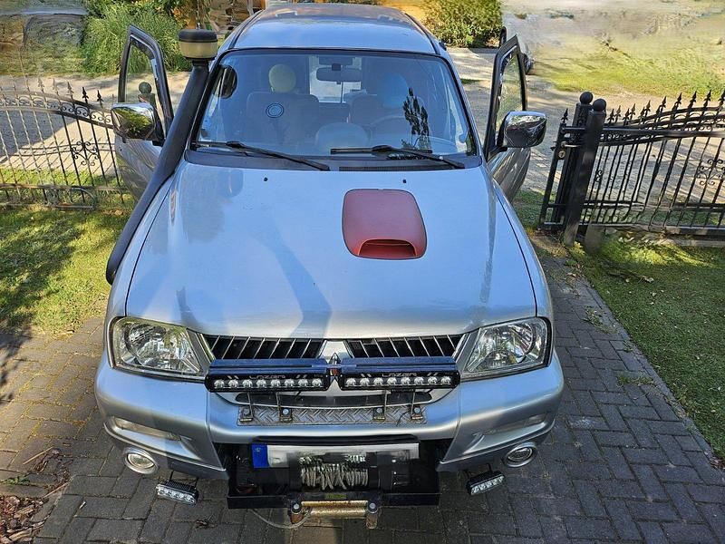 Gebraucht Mitsubishi L200 133 PS (97 kW) 2006 Silber Abholung