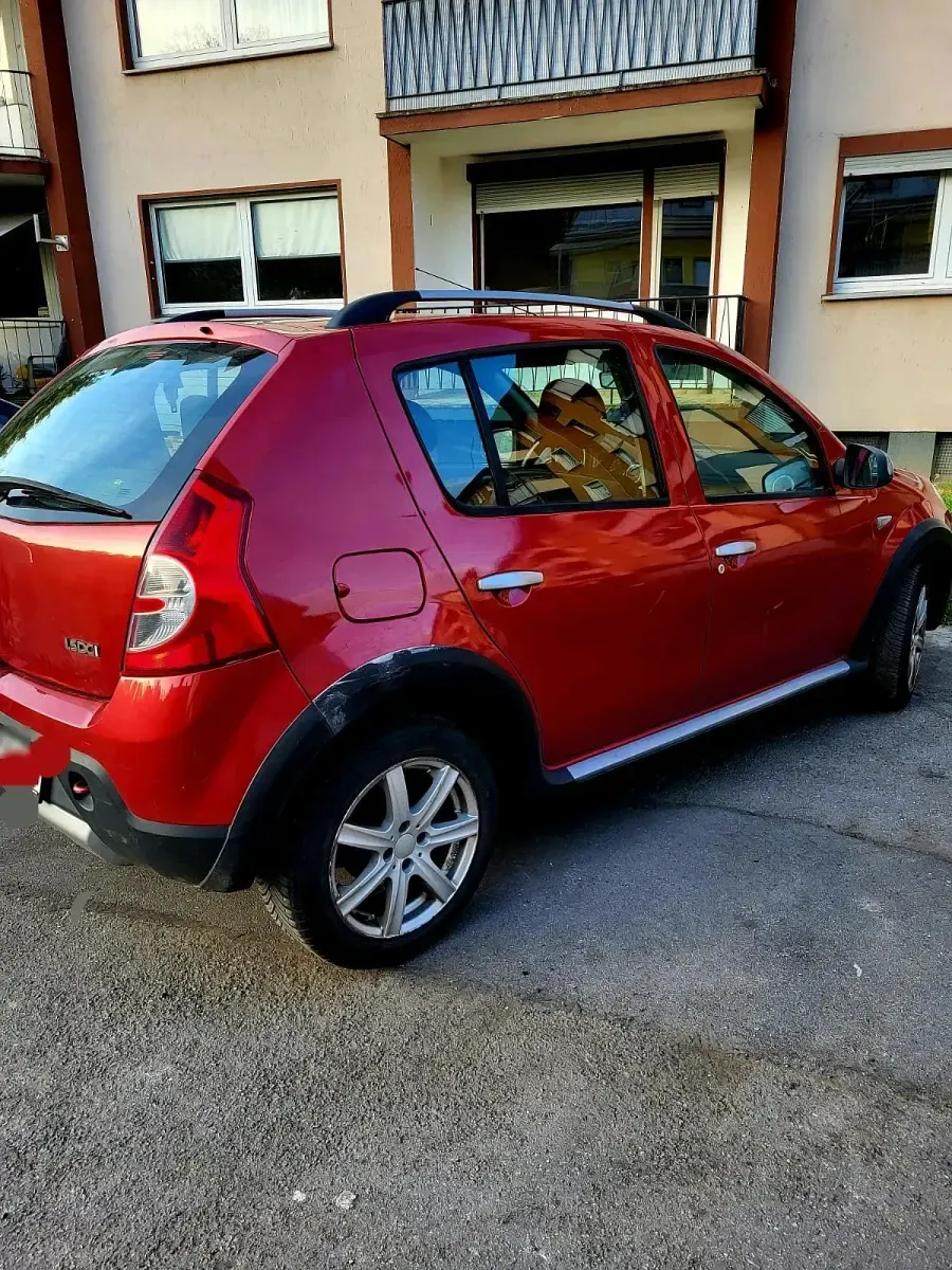 Gebraucht Dacia Sandero Stepway 86 PS (63 kW) 2011 Rot Kleinwagen