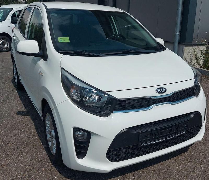 Weiß Gebraucht 2017 Kia Picanto DREAM-TEAM Edition Kleinwagen | 7.200 € (Etwas zu teuer) - Bild 1/4