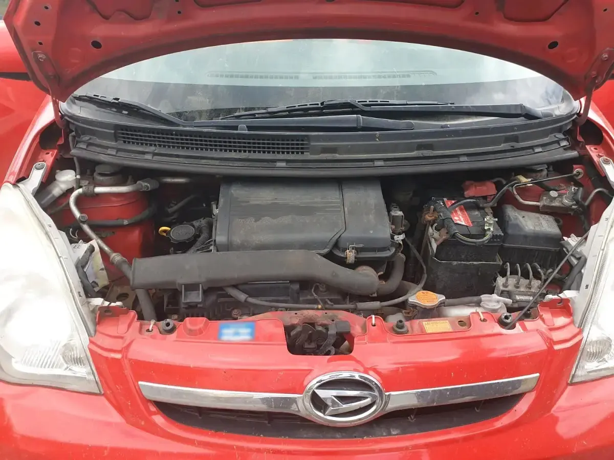 Gebraucht Daihatsu Cuore 69 PS (50 kW) 2008 Rot Kleinwagen