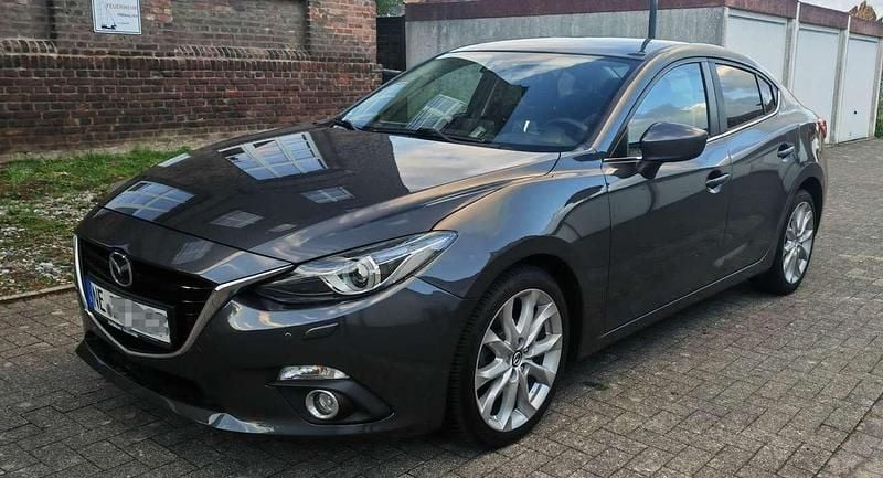 Grau Gebraucht 2014 Mazda 3 Sports-Line Limousine | 11.000 € (Fairer Preis) - Bild 1/4