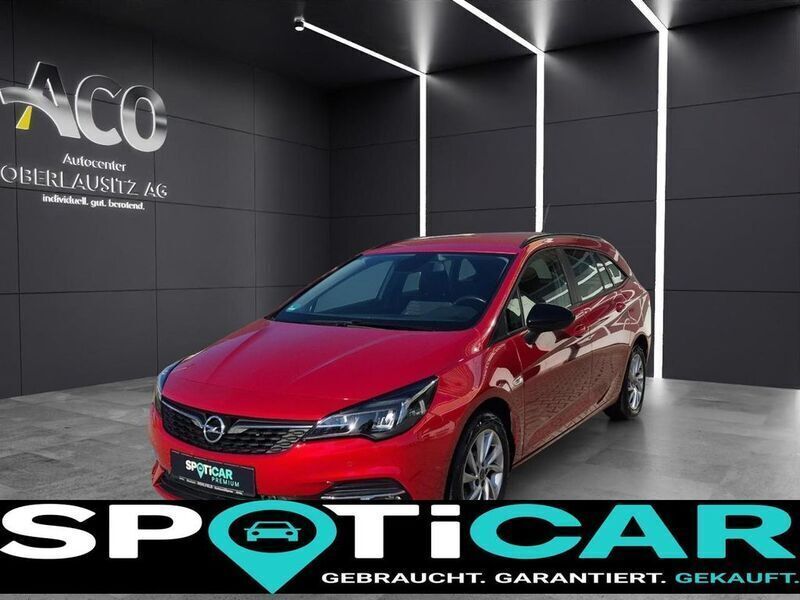 Chili rot/kardio rot Gebraucht 2021 Opel Astra Business Kombi | 16.490 € (Fairer Preis) - Bild 1/4