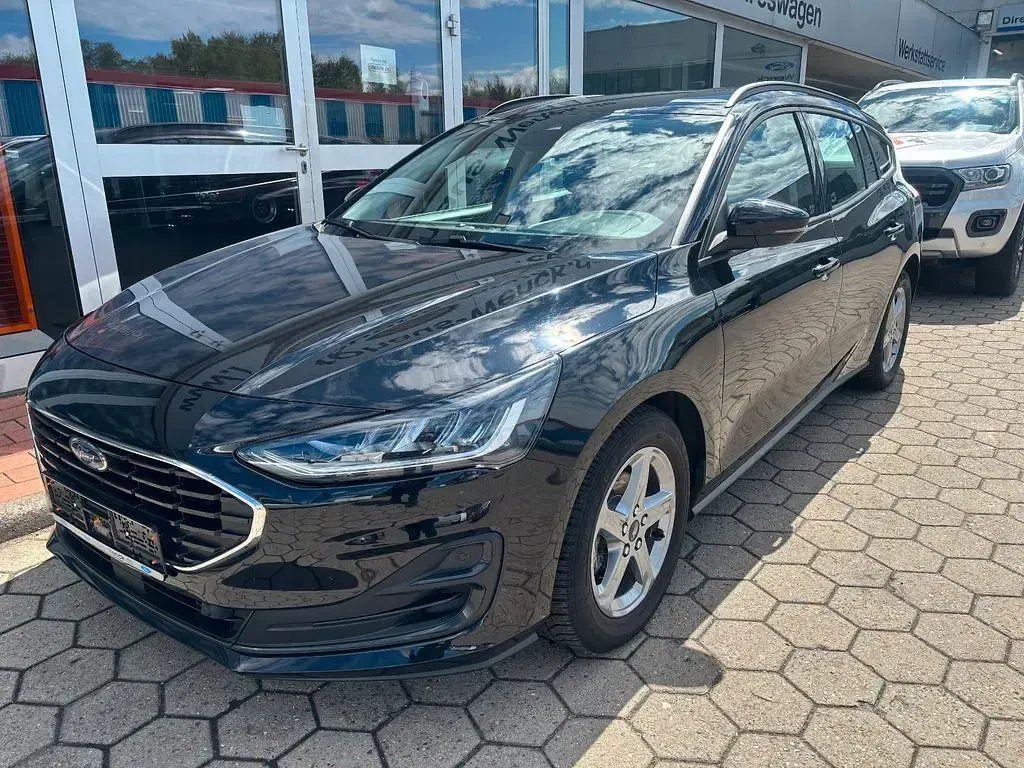 Używany Ford Focus Cool & Connect 120 KM (88 kW) 2012 Czarny Sedan/Limuzyna