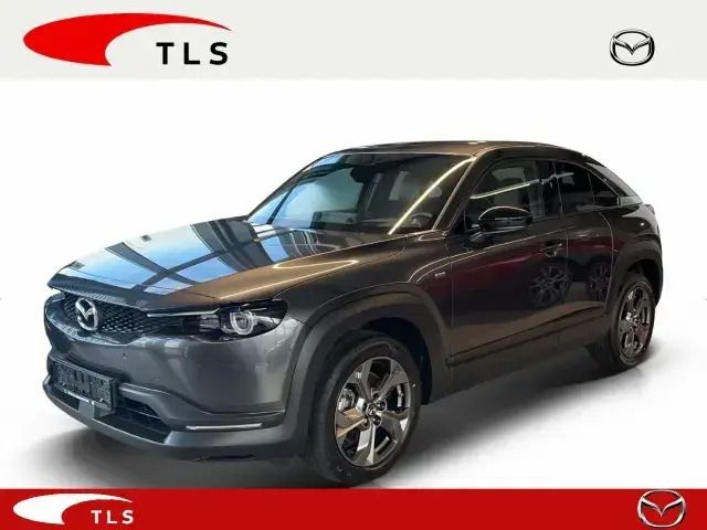 Machine gray Gebraucht 2023 Mazda MX30 Ad'Vantage SUV | 22.980 € (Etwas zu teuer) - Bild 1/4