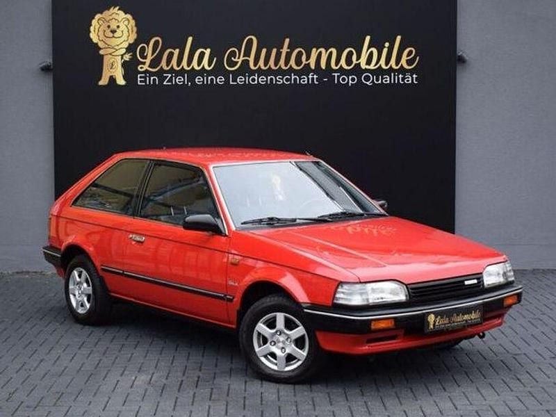 Gebraucht Mazda 323 75 PS (55 kW) 1988 Rot Kleinwagen