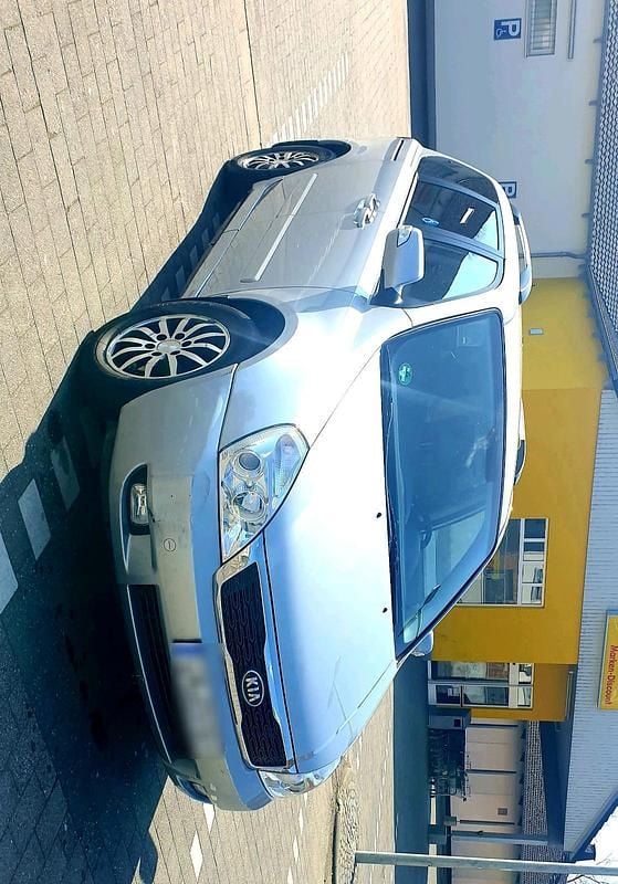 Gebraucht Kia Carnival 192 PS (141 kW) 2012 Grau Van / Kleinbus