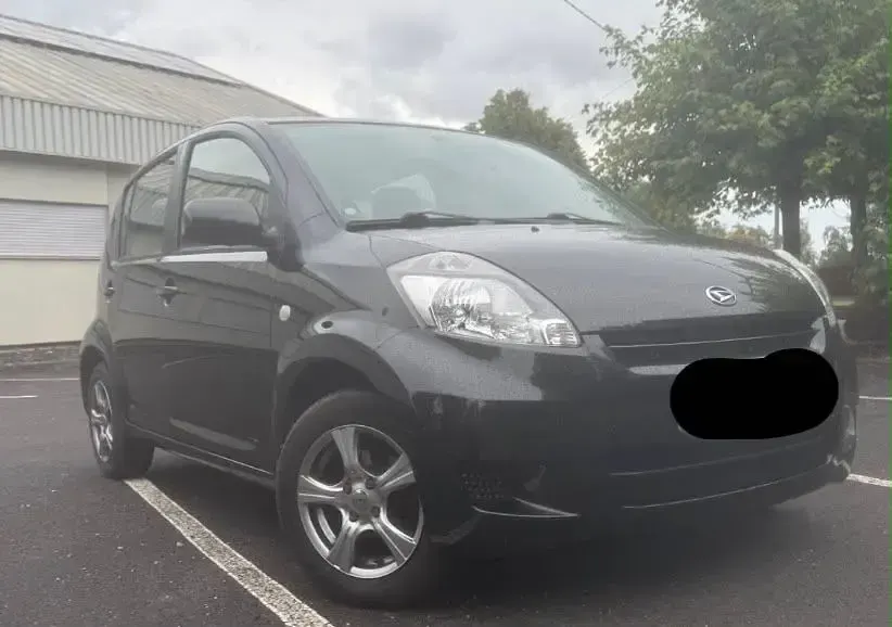 Gebraucht Daihatsu Sirion 91 PS (66 kW) 2010 Schwarz Kleinwagen