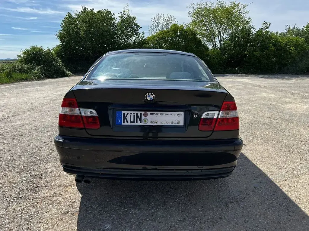 Second-hand BMW 320 Performance 150 CP (110 kW) 1998 Negru Berlinǎ