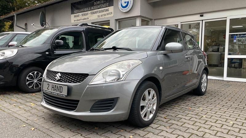Grau Gebraucht 2011 Suzuki Swift Kleinwagen | 5.990 € (Teuer) - Bild 1/4