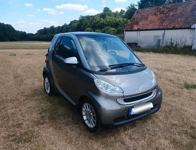Grau Gebraucht 2009 Smart ForTwo Coupé Kleinwagen | 5.000 € (Fairer Preis) - Bild 1/4