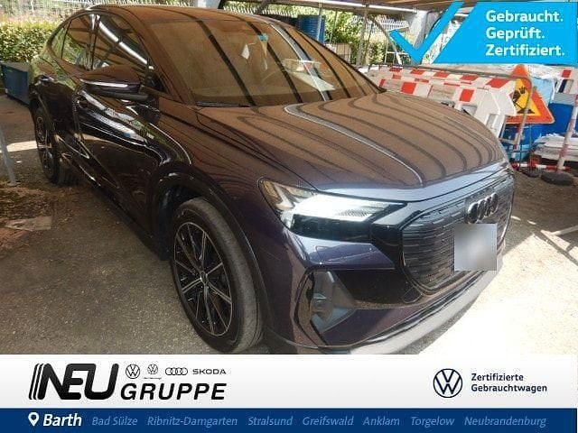Auroraviolett Gebraucht 2024 Audi Q4 Sportback e-tron Sport SUV | 43.879 € (Superpreis) - Bild 1/4