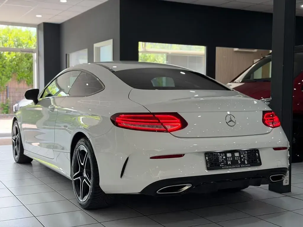 Gebraucht Mercedes C200 Night 184 PS (135 kW) 2019 Polarweiss Coupé