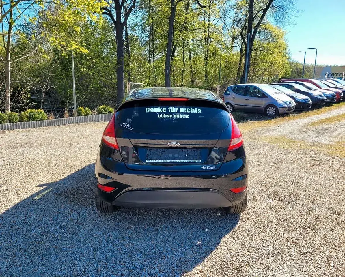 Second-hand Ford Fiesta Trend 60 CP (44 kW) 2012 Negru Hatchback