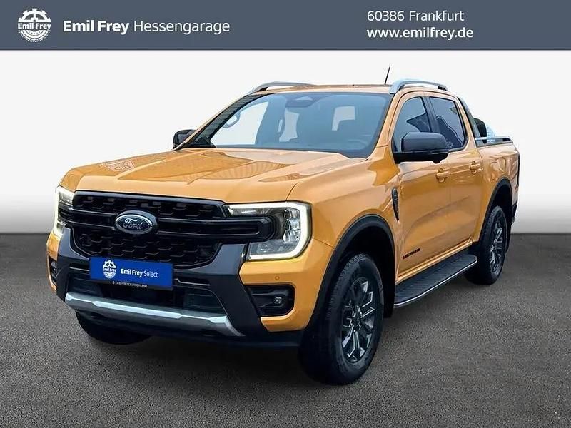 Cyber orange metallic Gebraucht 2023 Ford Ranger Wildtrack Abholung | 41.950 € (Fairer Preis) - Bild 1/4