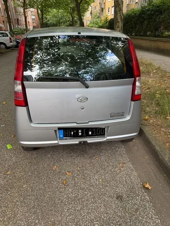 Gebraucht Daihatsu Cuore Plus 58 PS (42 kW) 2004 Grau Kleinwagen