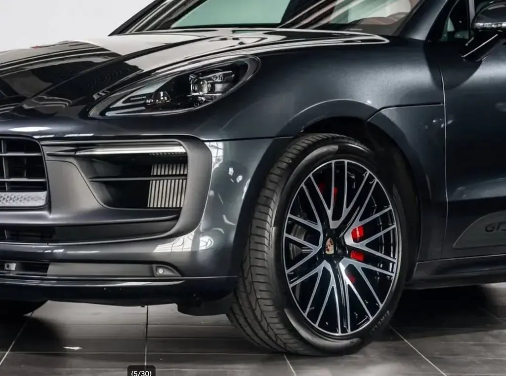 Gebraucht Porsche Macan 441 PS (324 kW) 2024 Vulkangrau SUV