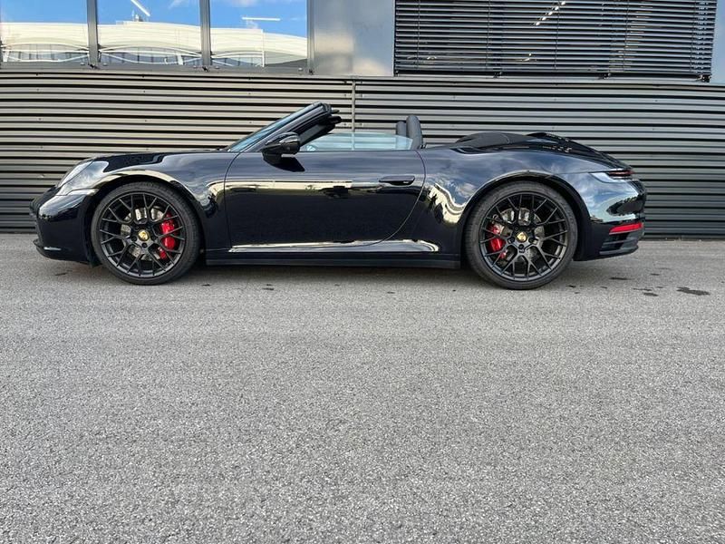 2t tiefschwarzmetallic Gebraucht 2024 Porsche 911 Carrera 4S Cabriolet Chrono Cabrio | 147.800 € - Bild 1/4