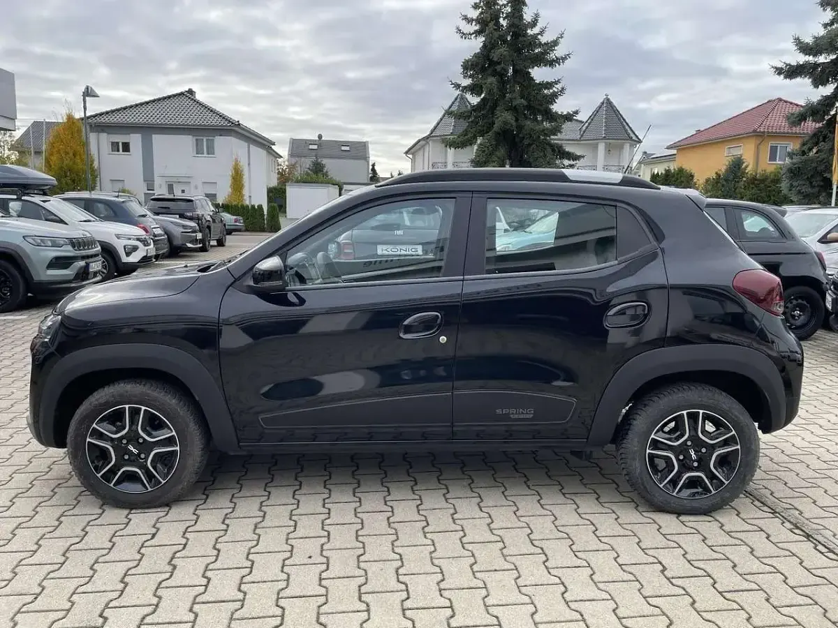 Gebraucht Dacia Spring Essentiel 19 kW (26 PS) 2023 Magmaschwarz Kleinwagen