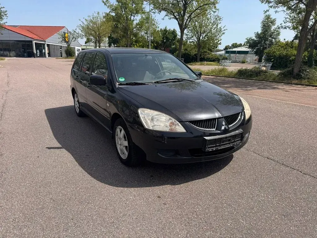 Gebraucht Mitsubishi Lancer 98 PS (72 kW) 2004 Schwarz Limousine