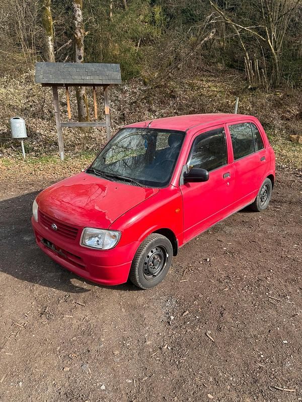 Gebraucht Daihatsu Cuore 56 PS (41 kW) 2002 Rot Kleinwagen